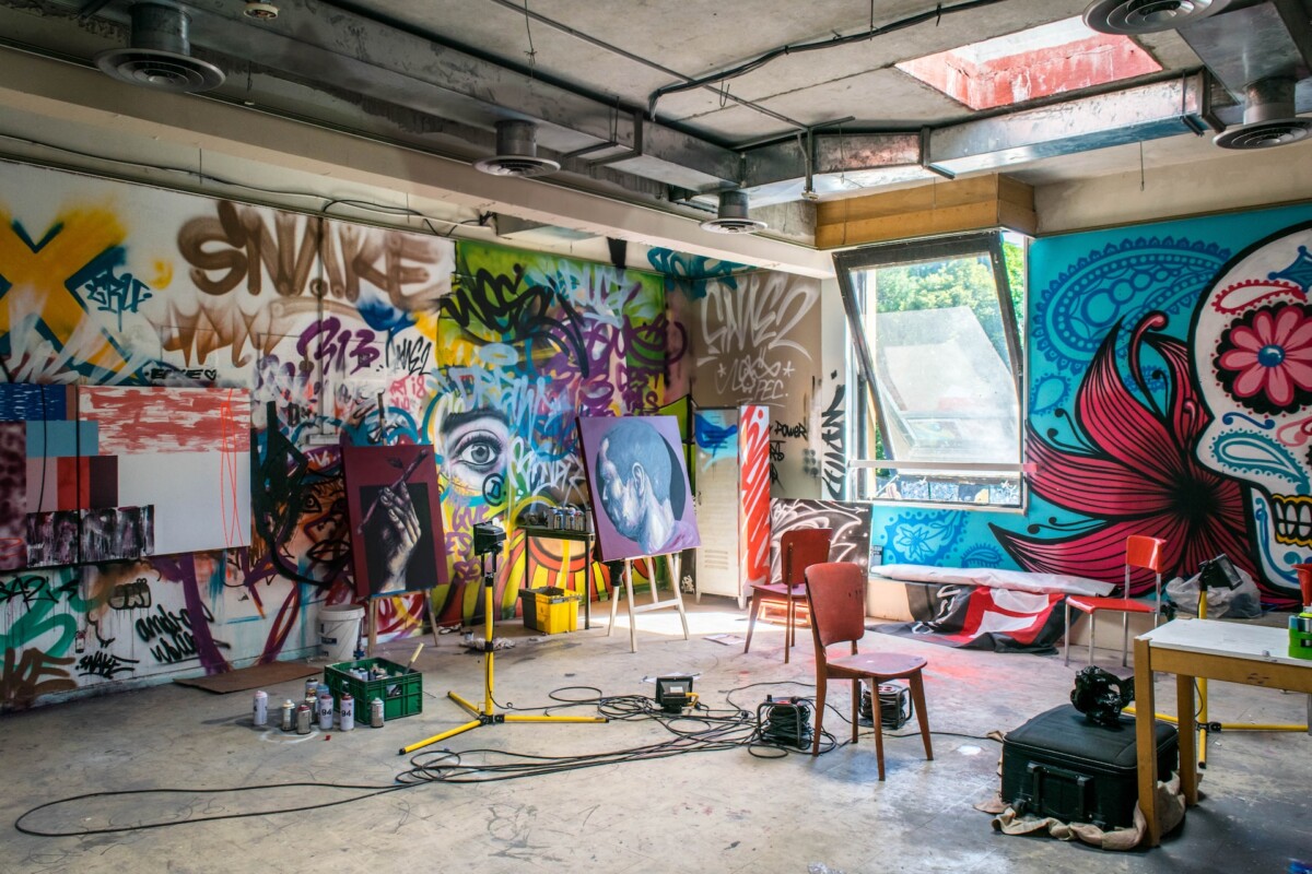 a creative room filled with paintings and arts